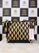 Elegant black and beige diamond pattern shoulder handbag – front view.