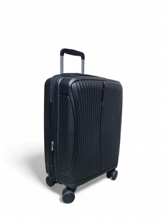 Black suitcase with wheels on a white background