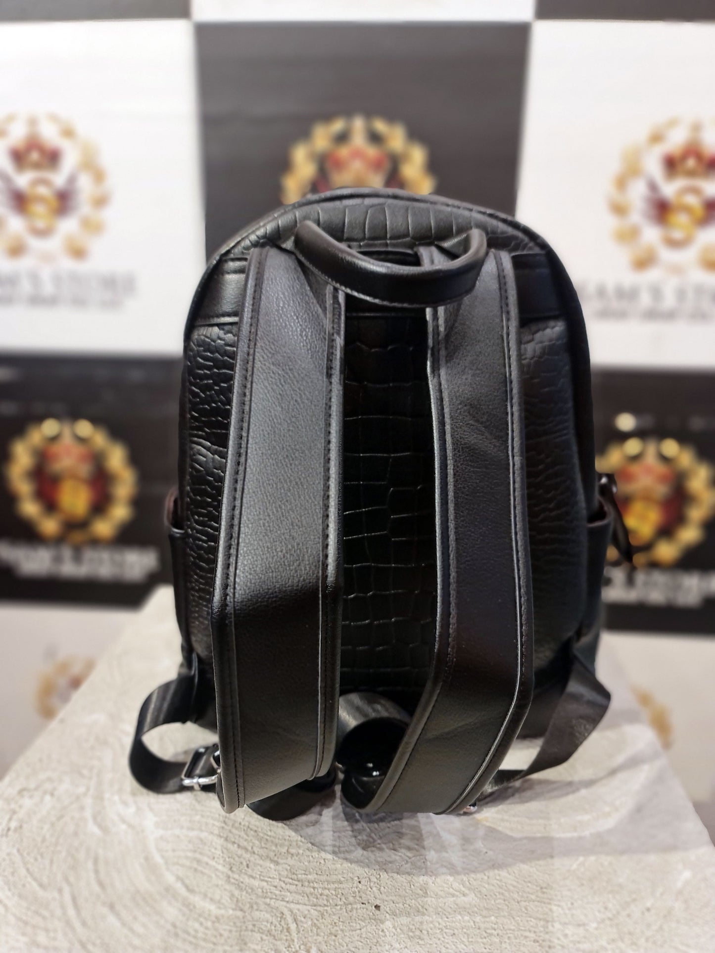 Black Textured Faux Leather Backpack – Compact & Stylish
