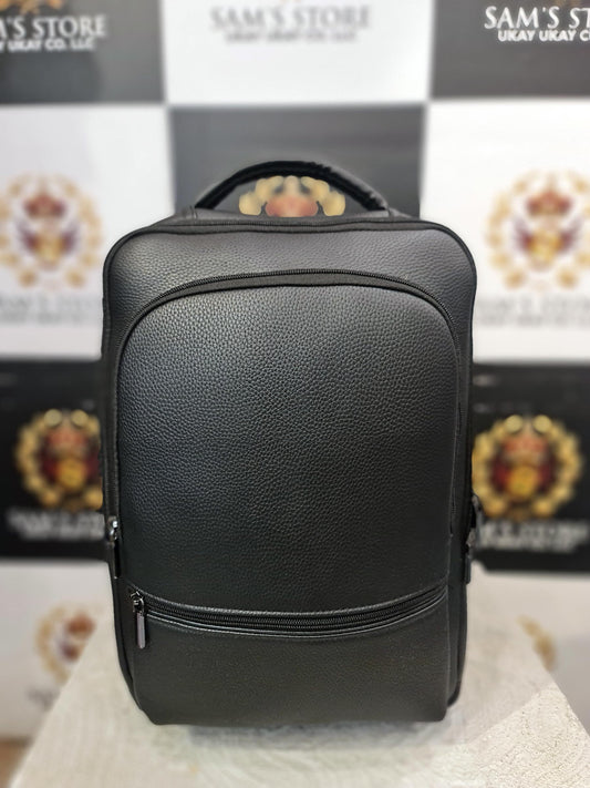 Black leather-textured tech backpack with USB & Type-C ports – front and main zip compartments