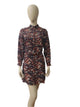 Front view of abstract print button-down mini dress with belt