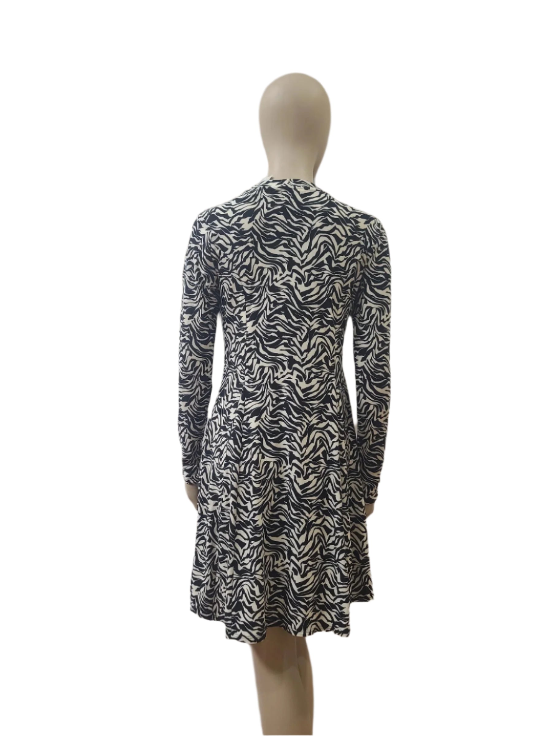 Back view of zebra pattern cotton mini dress with zip closure