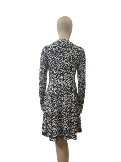 Back view of zebra pattern cotton mini dress with zip closure