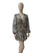 Front view of Calli zebra print mini dress with V-neck and full sleeves