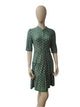 Ladies green printed mini dress with short sleeves – front view